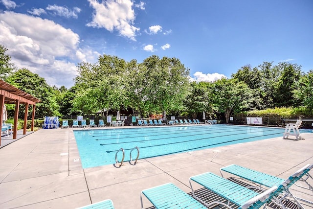 view of swimming pool featuring a patio