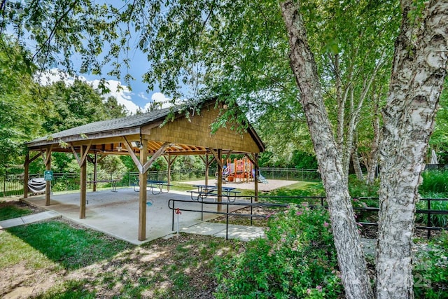 view of property's community with a gazebo and a playground