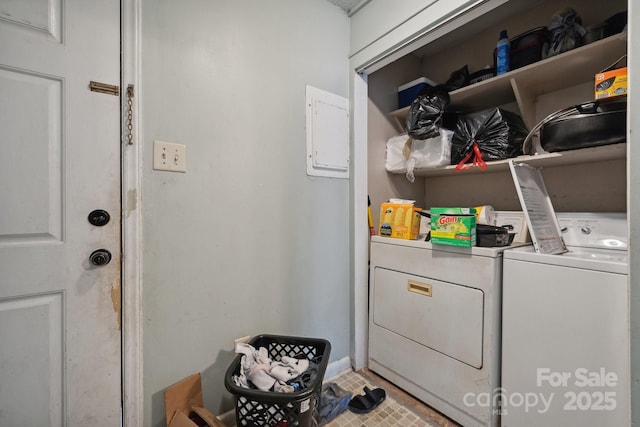 laundry area with independent washer and dryer