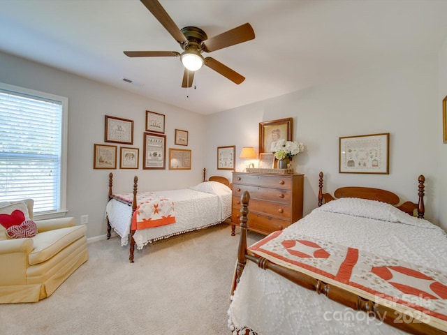 bedroom featuring carpet floors and ceiling fan