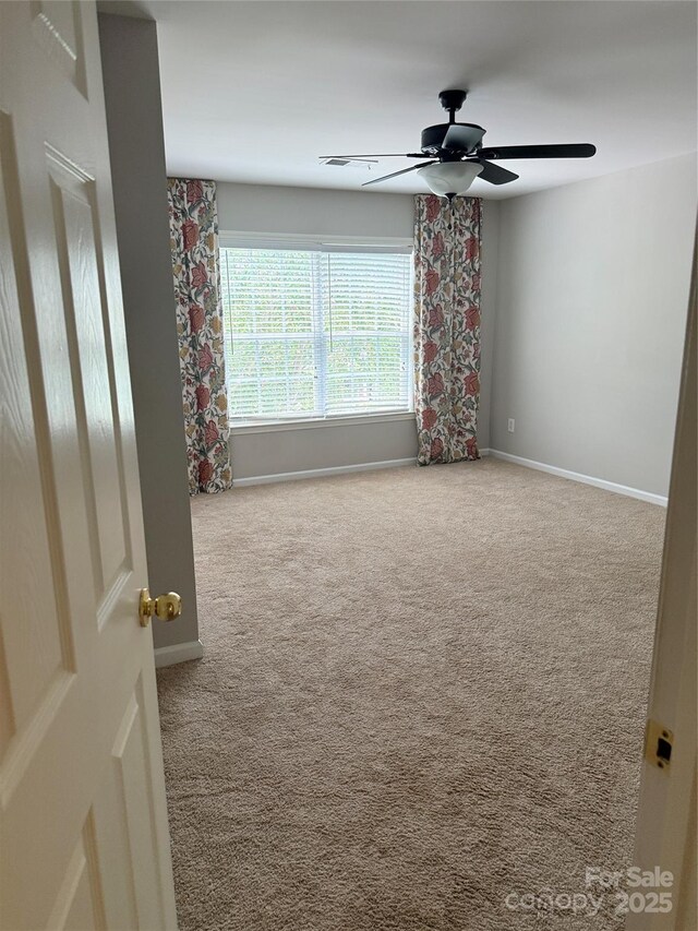 6706 Blackwood Ln, Waxhaw, NC 28173 - empty room with carpet, a ceiling fan, and baseboards