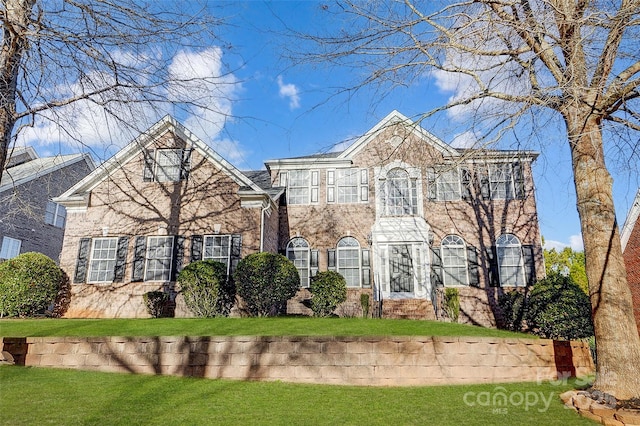 view of front of home with a front yard