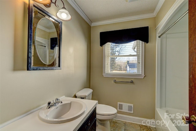 bathroom with vanity, ornamental molding, a textured ceiling, and toilet