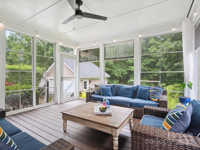 sunroom / solarium with ceiling fan