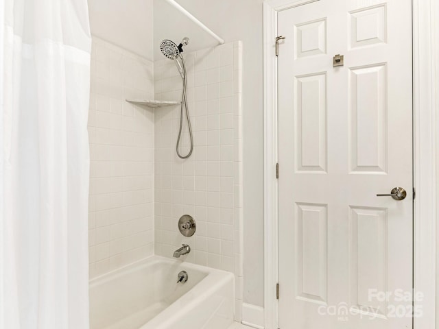 bathroom with shower / tub combo