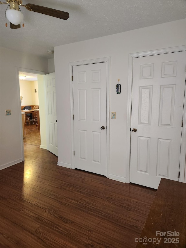 interior space featuring dark wood-type flooring