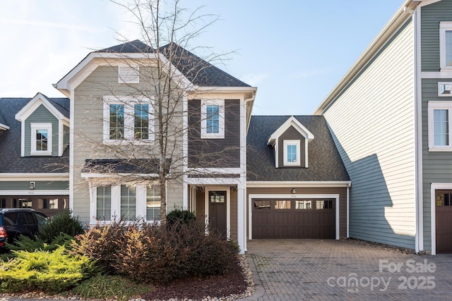 view of front of property featuring a garage