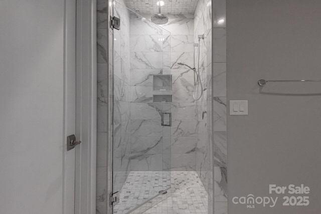 bathroom featuring walk in shower