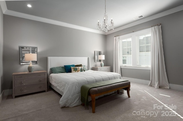 carpeted bedroom with an inviting chandelier and ornamental molding