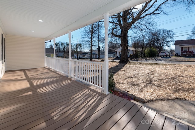 wooden terrace featuring a porch