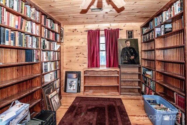 interior space with ceiling fan