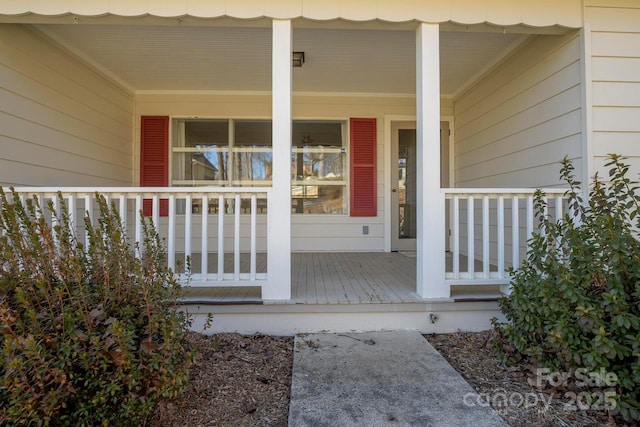 doorway to property with a porch