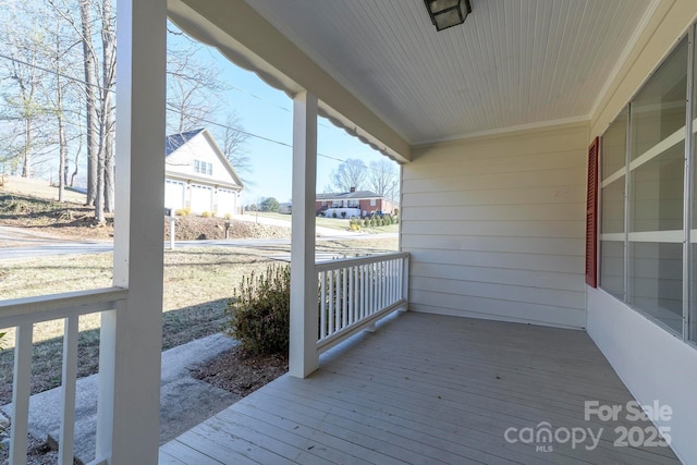 wooden terrace with covered porch