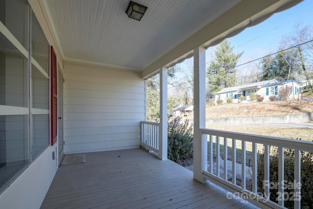 wooden deck featuring a porch