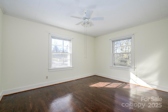 unfurnished room featuring dark hardwood / wood-style flooring, ceiling fan, crown molding, and a wealth of natural light