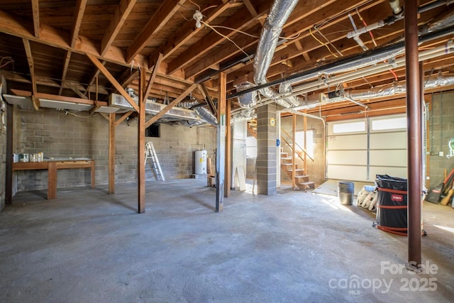 basement featuring water heater