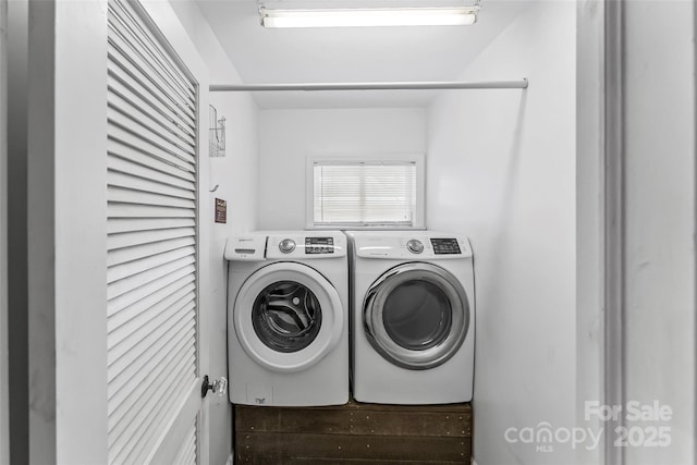 laundry room with independent washer and dryer