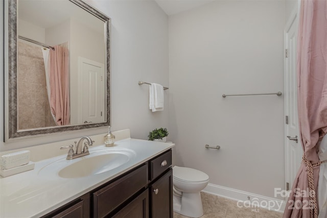 bathroom featuring toilet, a shower with curtain, tile patterned floors, and vanity