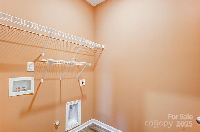 laundry area featuring hookup for a washing machine, hookup for a gas dryer, hardwood / wood-style flooring, and electric dryer hookup