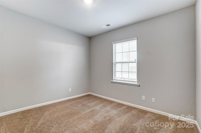 view of carpeted spare room