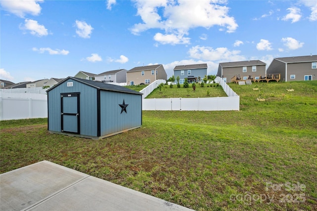 view of yard with a patio area and a shed