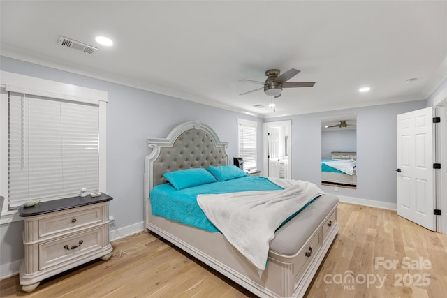 bedroom featuring ceiling fan, ornamental molding, and light hardwood / wood-style floors