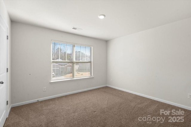 view of carpeted spare room