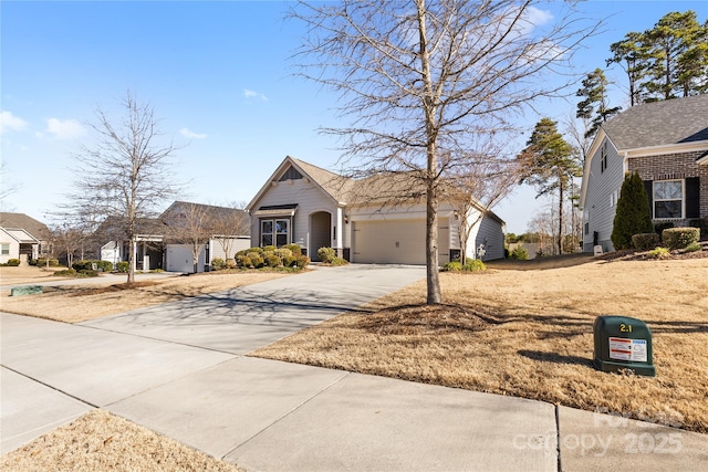 9307 Dufaux Dr, Charlotte, NC 28278 - view of front of property with a garage and concrete driveway
