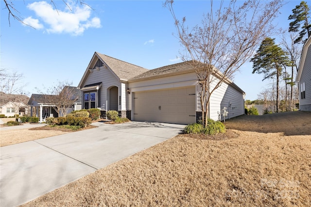 9307 Dufaux Dr, Charlotte, NC 28278 - ranch-style home with a garage and concrete driveway