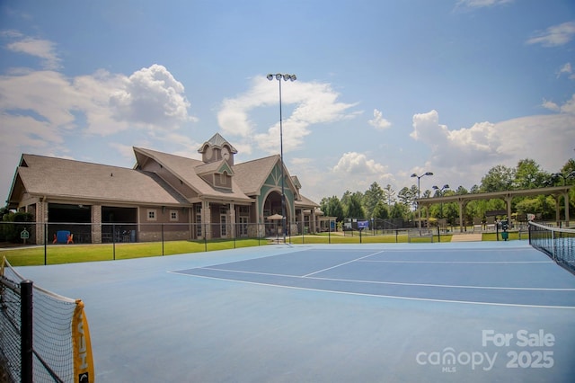 9307 Dufaux Dr, Charlotte, NC 28278 - view of sport court with fence, community basketball court, and a lawn