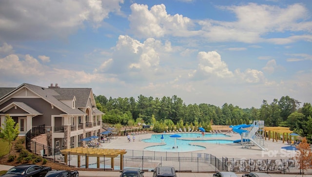 9307 Dufaux Dr, Charlotte, NC 28278 - community pool with a patio area and fence