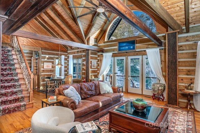 living room with hardwood / wood-style floors, beamed ceiling, and wooden ceiling