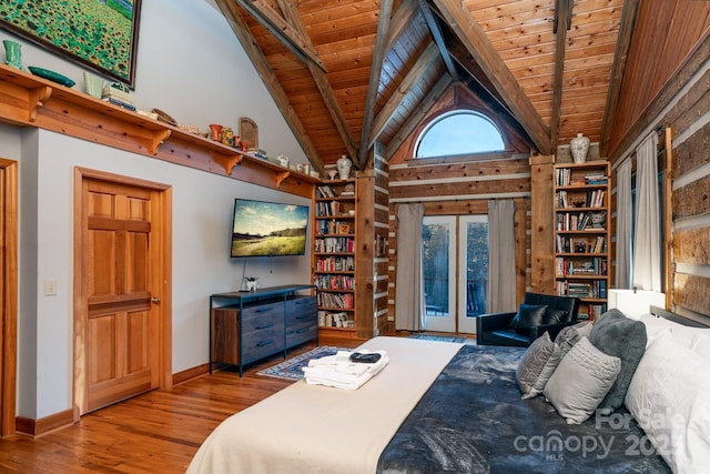 bedroom with high vaulted ceiling, wooden ceiling, beamed ceiling, and french doors