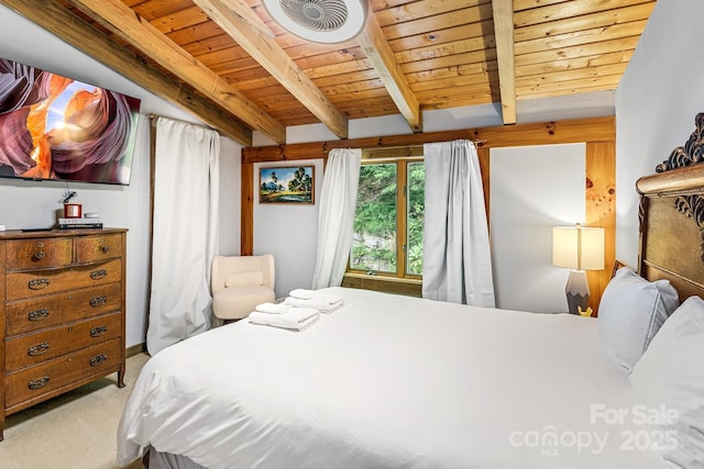 carpeted bedroom featuring wood ceiling and vaulted ceiling with beams