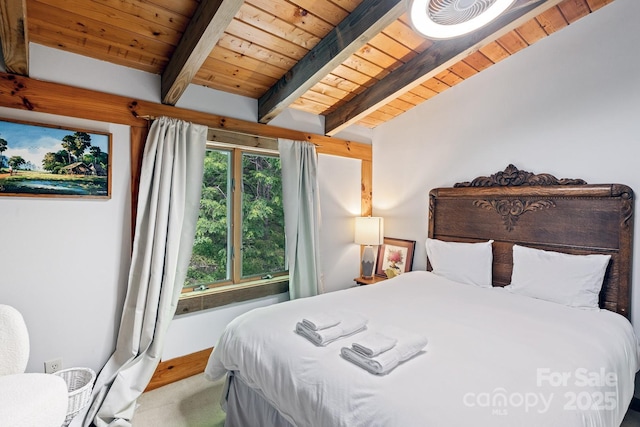 bedroom featuring wood ceiling and lofted ceiling with beams