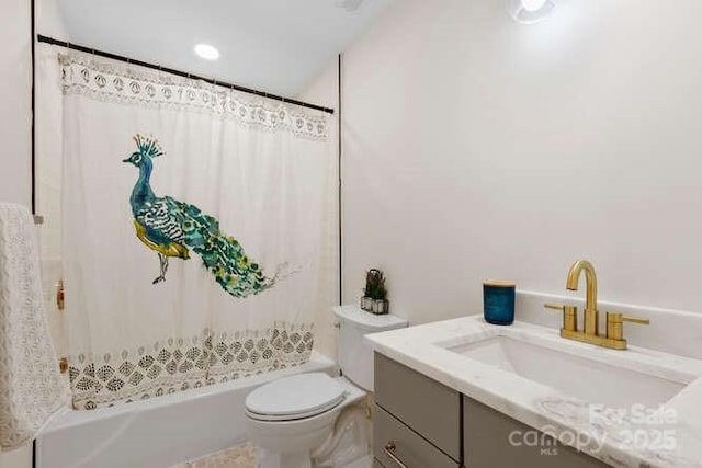 full bathroom with toilet, vanity, and shower / bathtub combination with curtain