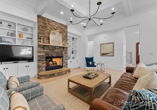 living room featuring a notable chandelier, built in features, beamed ceiling, and a fireplace