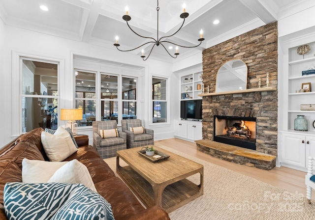 living room featuring coffered ceiling, light wood-type flooring, a fireplace, beam ceiling, and built in shelves