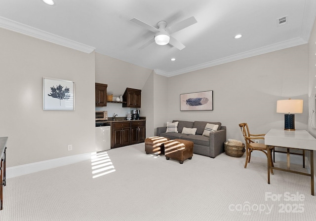 living room featuring ceiling fan, light colored carpet, and crown molding