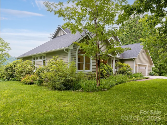 15 Breckenridge Dr, Fairview, NC 28730 - view of front of property with a shingled roof, a front lawn, a garage, and driveway