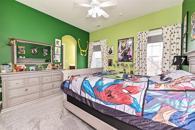 bedroom with ceiling fan and carpet