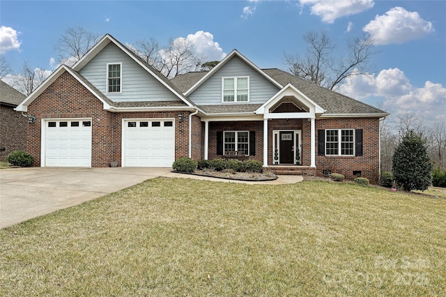 view of front of home with a garage and a front lawn