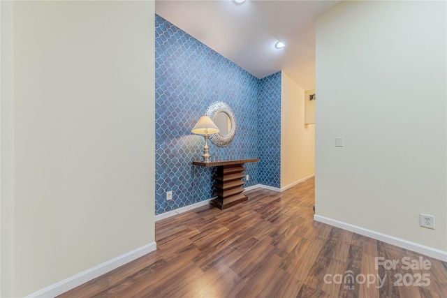 hall with dark hardwood / wood-style floors