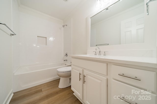 full bathroom with toilet, crown molding, shower / tub combination, vanity, and hardwood / wood-style floors