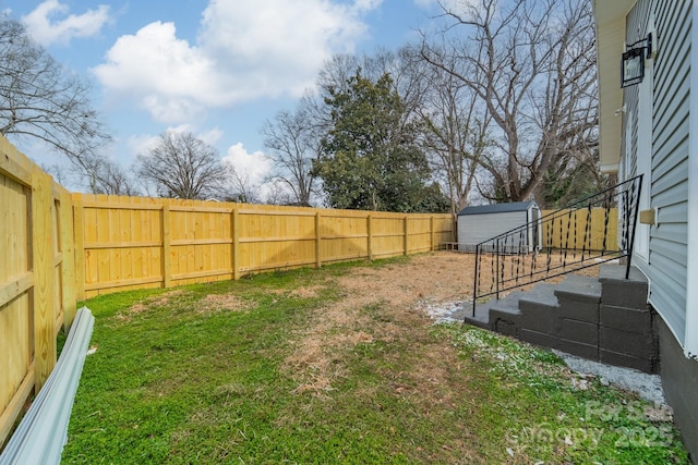 view of yard with a storage shed