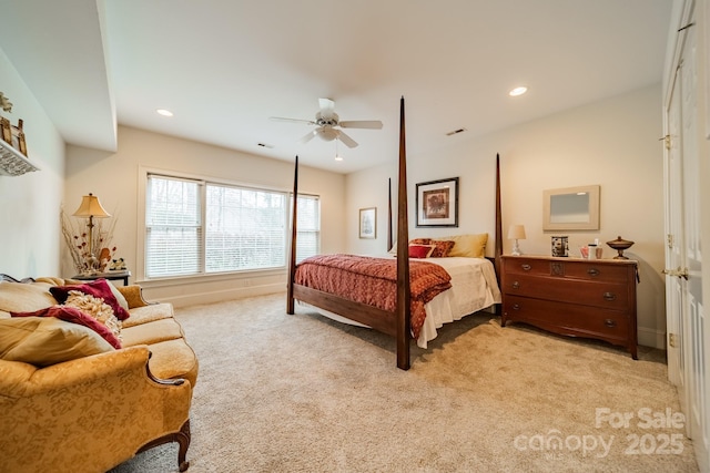 carpeted bedroom featuring ceiling fan