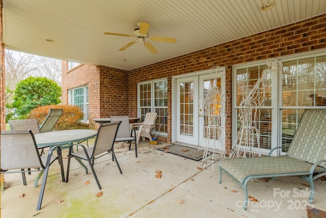 view of patio featuring ceiling fan