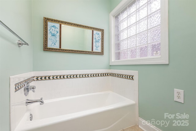 bathroom featuring a tub