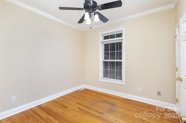 unfurnished room featuring ceiling fan, crown molding, and hardwood / wood-style flooring