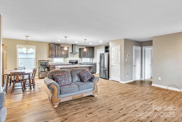 living room with light hardwood / wood-style flooring